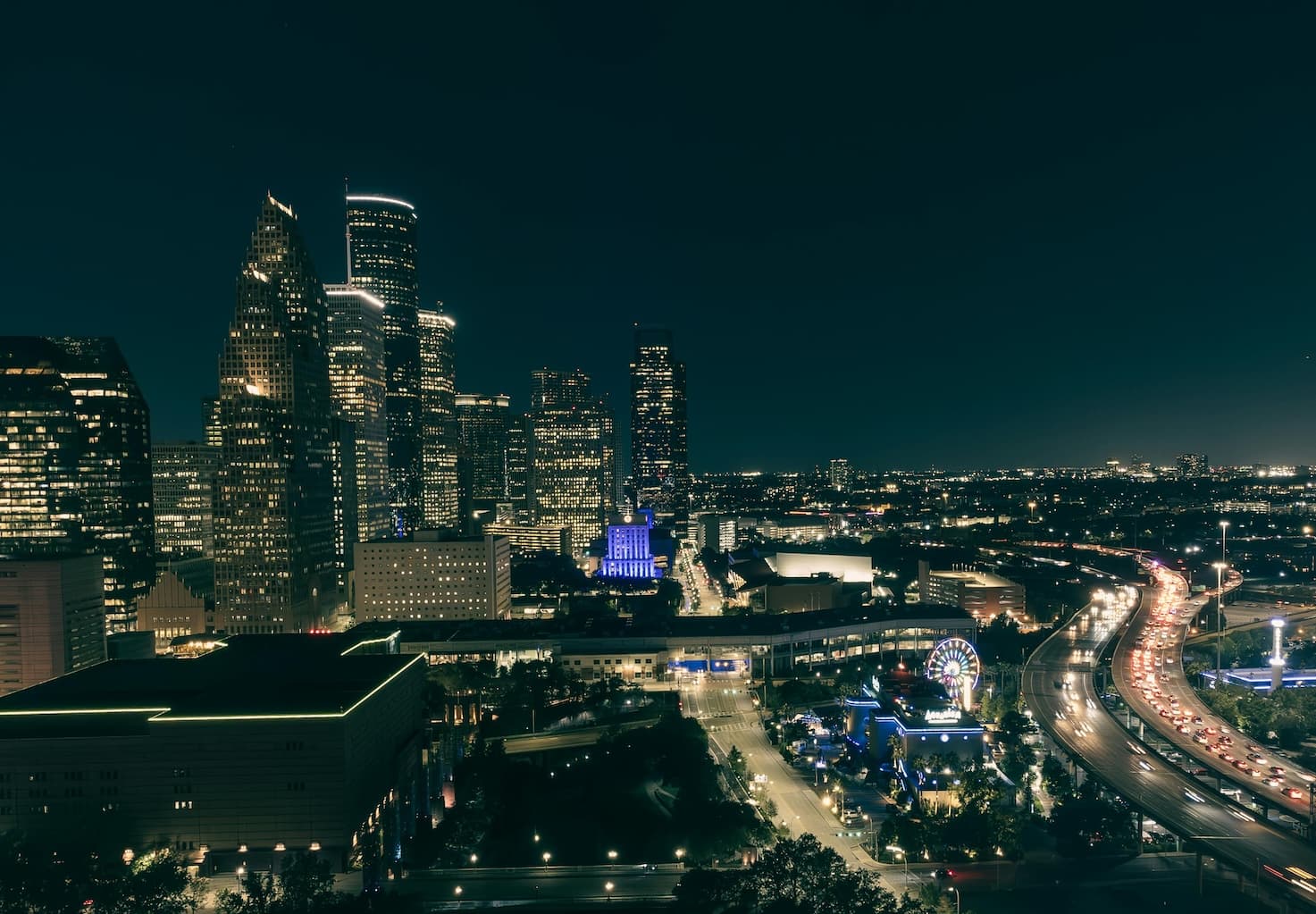 Downtown houston skyline lit up at night